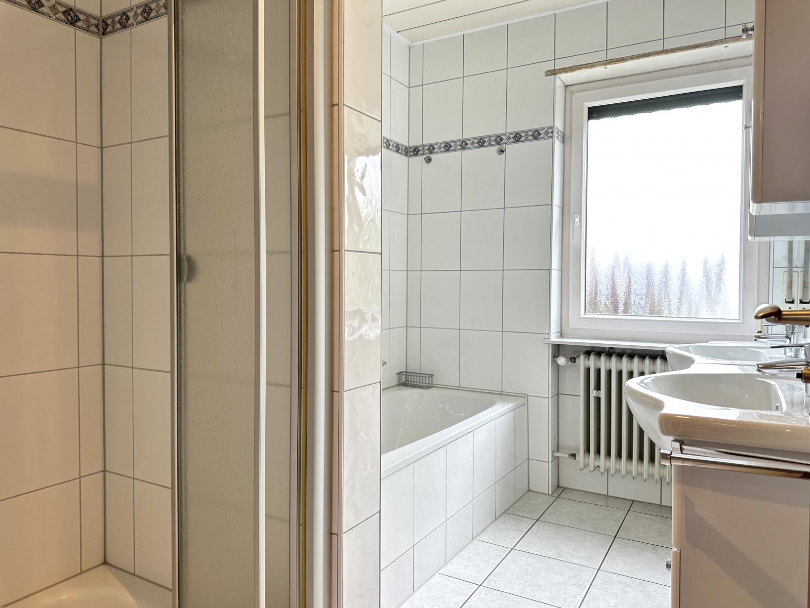 Wohnen mit Wohlfühlcharakter - Doppelhaushälfte mit Garten und Garage in beliebter Wohnlage