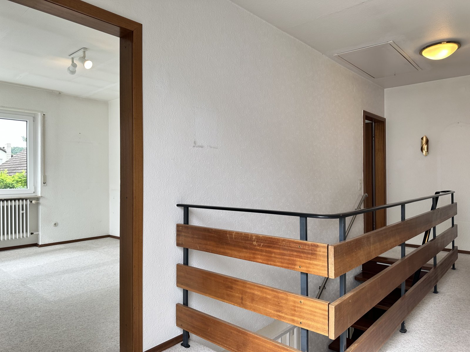 Wohnen mit Wohlfühlcharakter - Doppelhaushälfte mit Garten und Garage in beliebter Wohnlage