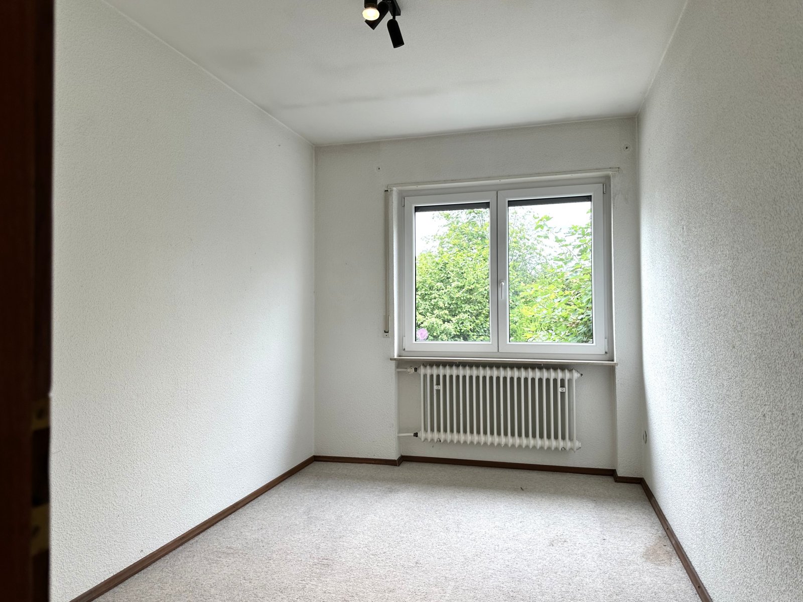 Wohnen mit Wohlfühlcharakter - Doppelhaushälfte mit Garten und Garage in beliebter Wohnlage
