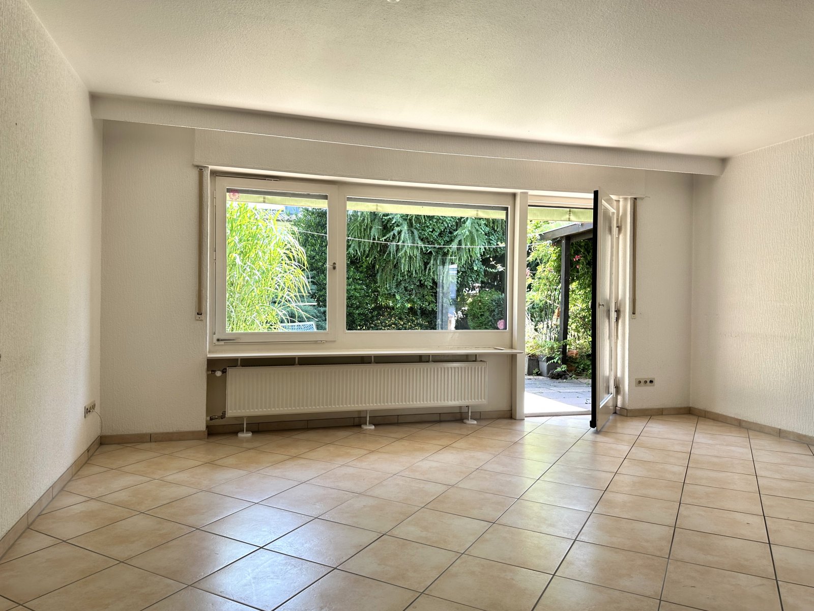 Wohnen mit Wohlfühlcharakter - Doppelhaushälfte mit Garten und Garage in beliebter Wohnlage 