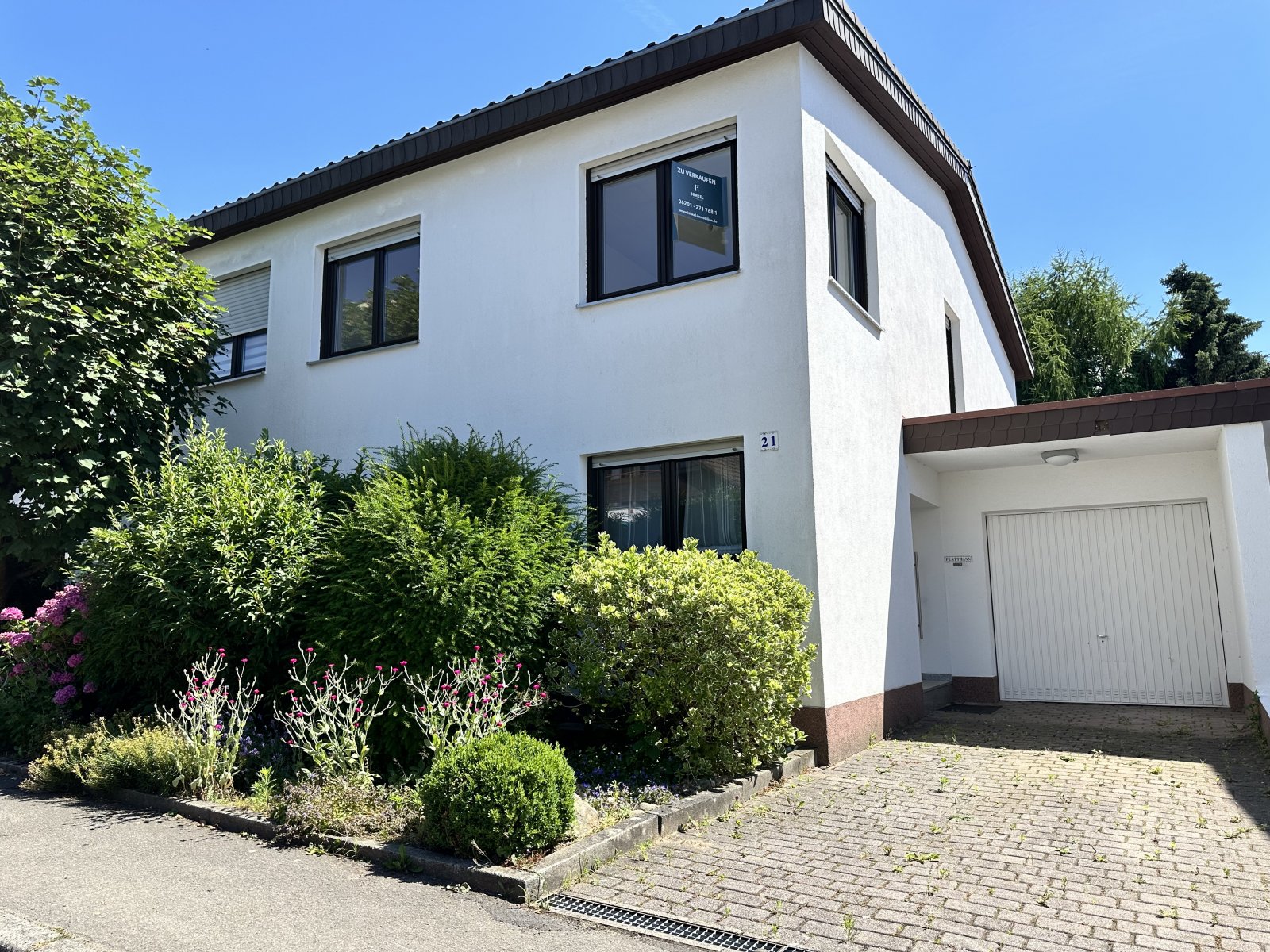 Wohnen mit Wohlfühlcharakter - Doppelhaushälfte mit Garten und Garage in beliebter Wohnlage 