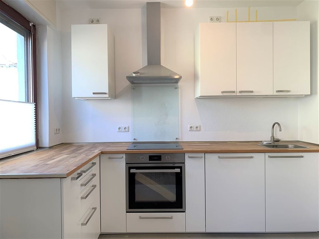 Liebevoll renoviertes Doppelhaus mit 3 Zimmern, Balkon & Innenhof